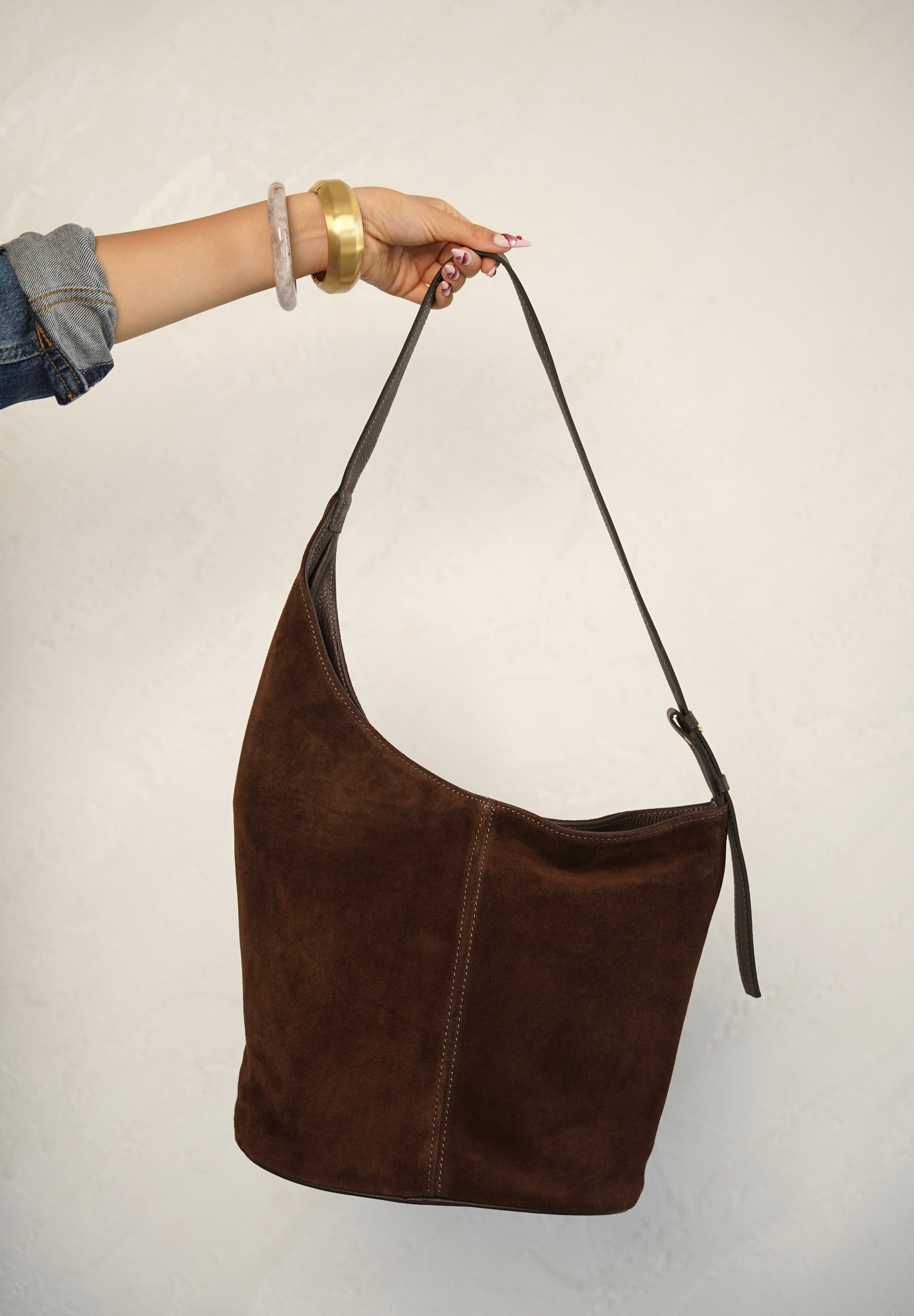 תיק עור קלרה חום.