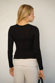 חולצת ניקי רומי שחורה
