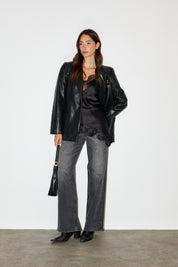 גופיית תחרה אסימטרית שחורה