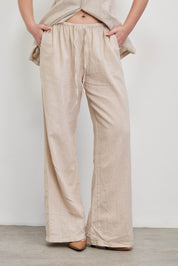 מכנסי פשתן בז׳