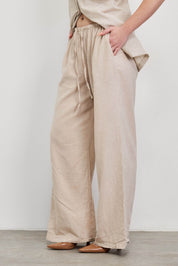 מכנסי פשתן בז׳