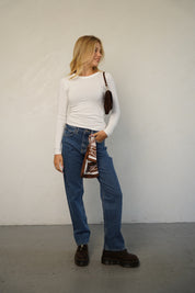 חולצת ניקי כותנה נועם לבנה